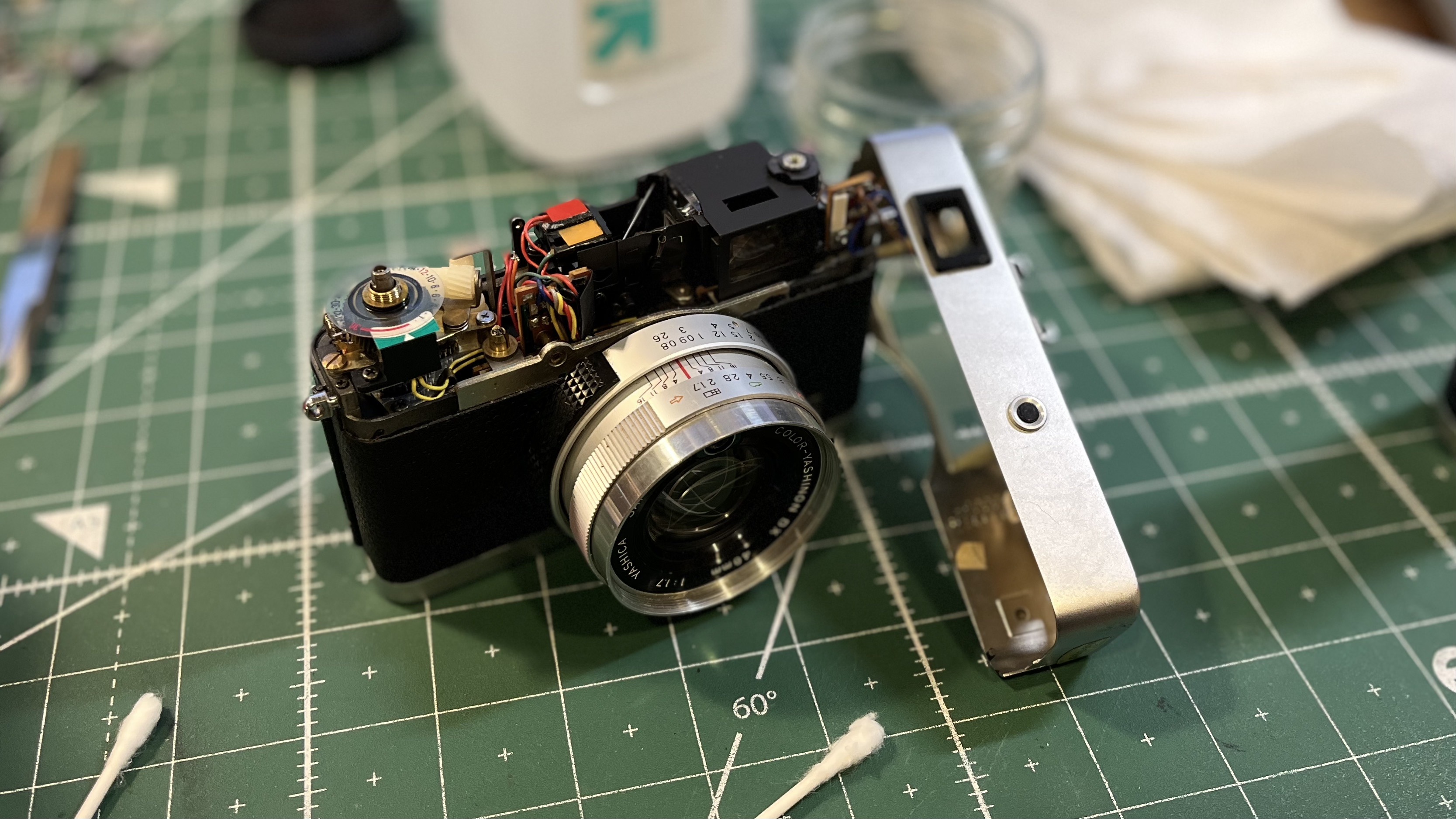 I recently found a Yashica Electro 35 GX in an antique shop in surprisingly good condition!
 Still, it had a fogged up rangefinder patch making focusing difficult.